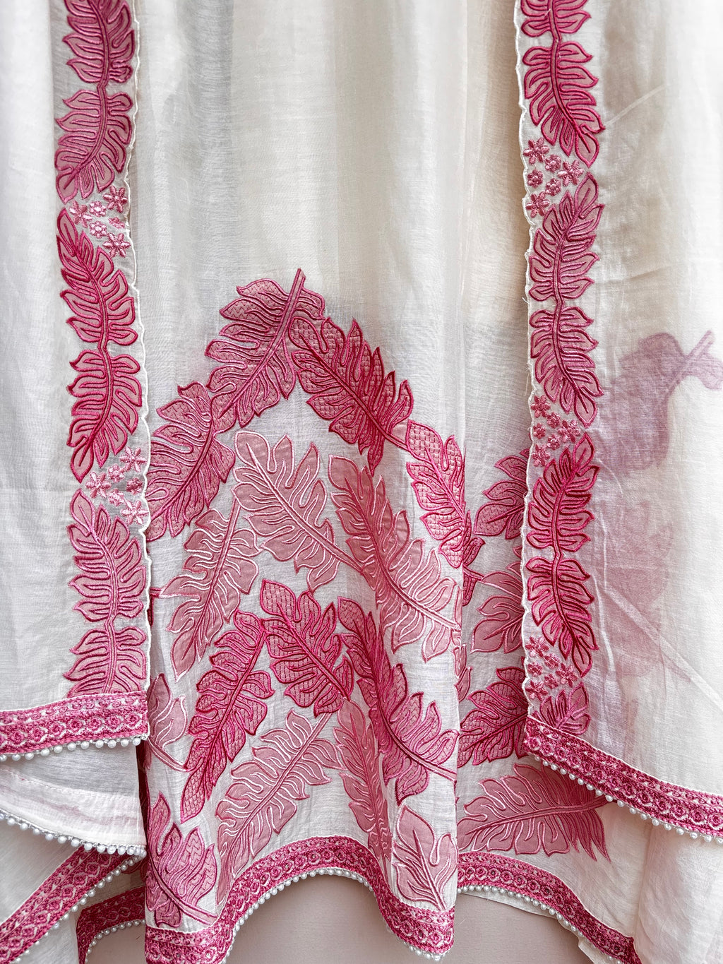 White Mulmul Chanderi suit with soft leaves patchwork embroidery